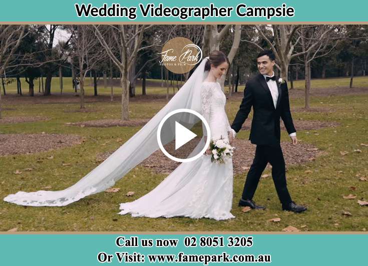 Bride and Groom looking at each other while walking in the park Campsie NSW 2194