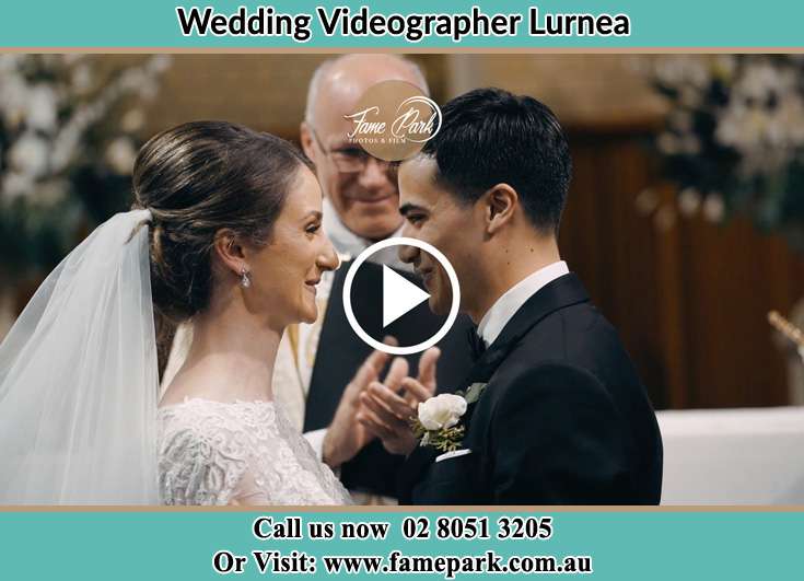 Bride and Groom looking at each other at the ceremony Lurnea NSW 2170