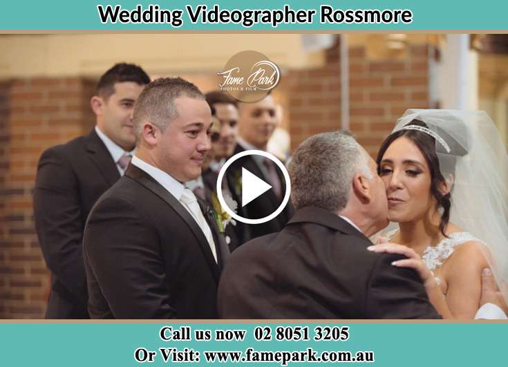 The Bride greeted by her father Rossmore NSW 2557