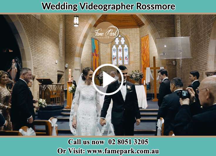 The Groom and the Bride walking out the church Rossmore NSW 2557