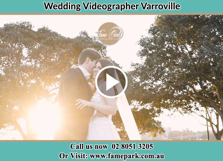 The Bride and the groom posing at the camera Varroville NSW 2566