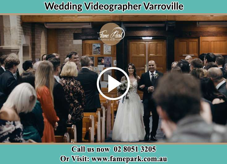 The Bride walking down the aisle with her groom Varroville NSW 2566